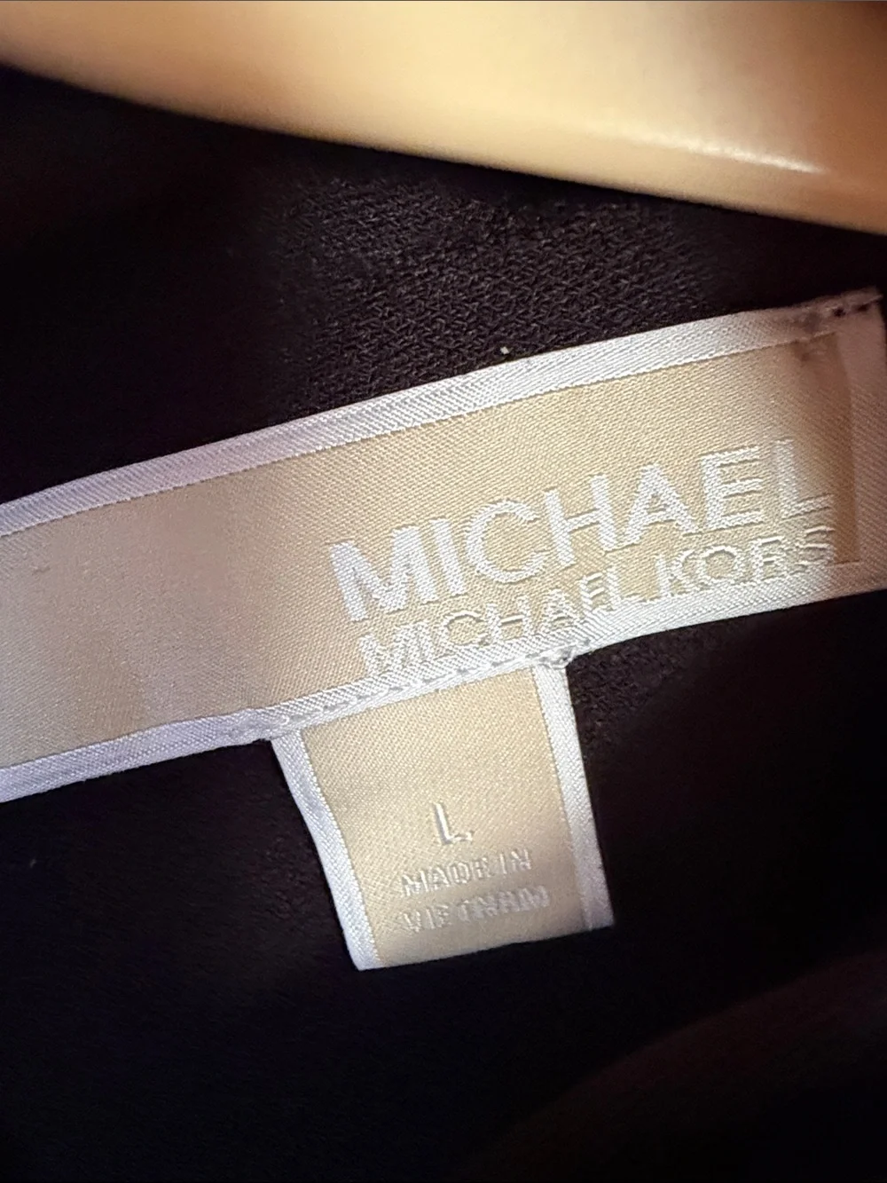 Michael Kors Black Long-Sleeve Keyhole Top with Gold Bar